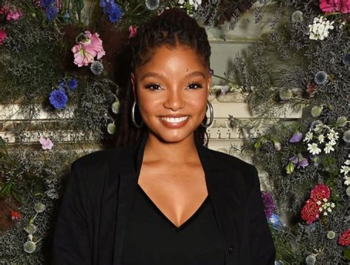 Mastering The Art Of The Hair Flip: Halle Bailey's Training Secrets